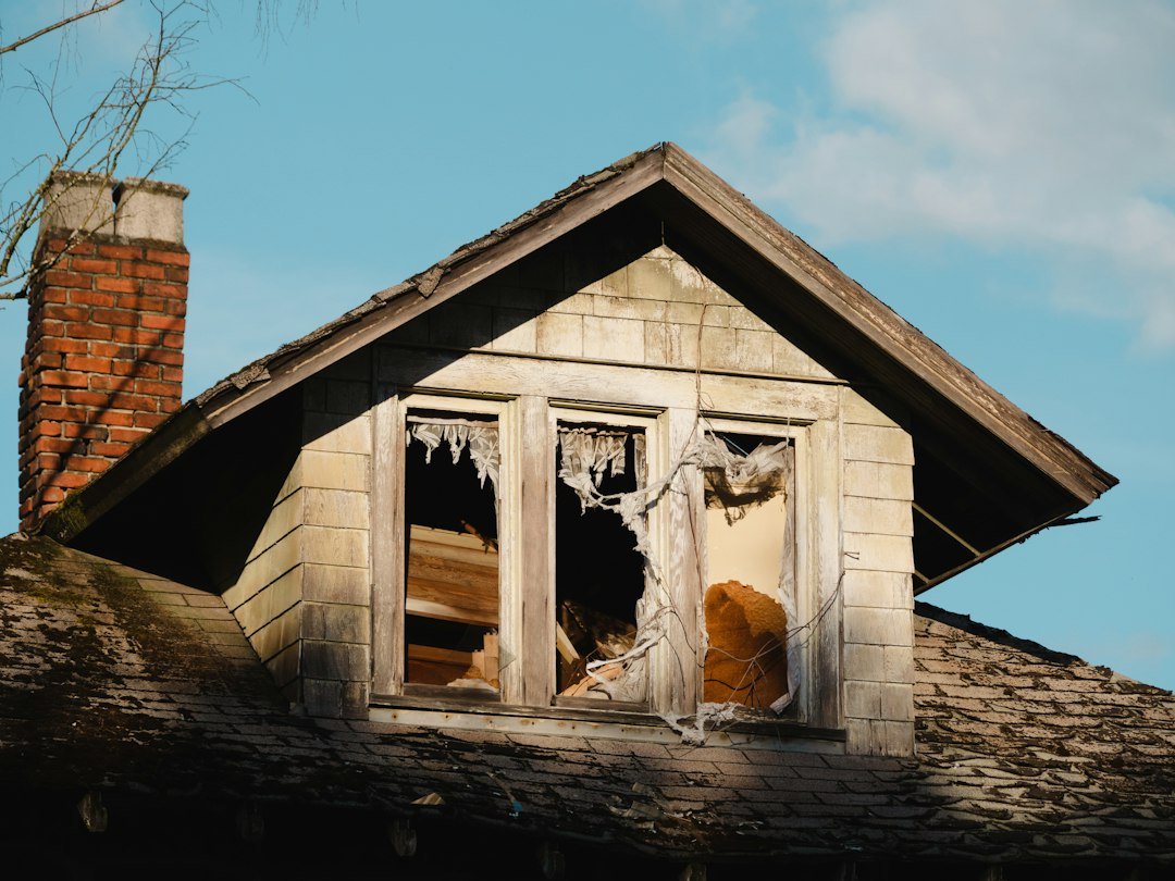 Illustrative view of a damaged residential window before temporary securing